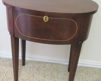 Brandt oval table with storage