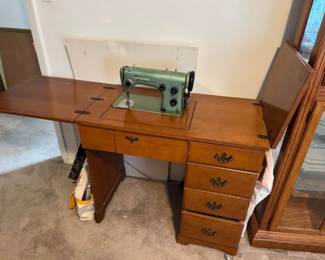 Viking sewing machine in cabinet- 