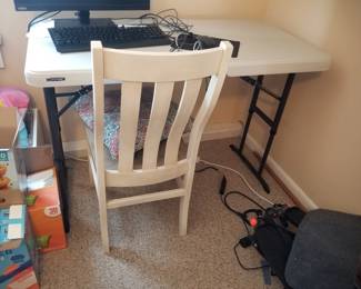 Folding table; chair goes with dining set 