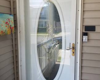 Entry door with electronic lock; storm door