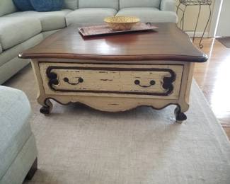 Coffee table with storage drawer
