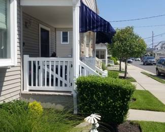 Vinyl rainling; navy & white canvas awning