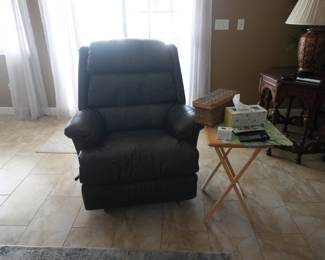 Black leather recliner with folding wood TV tray table included.