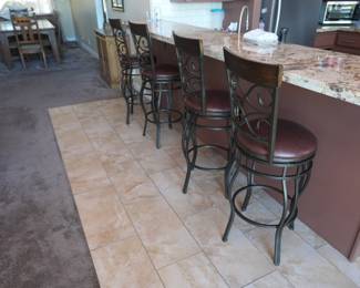 Wrought iron swivel bar stools. Brown. Kitchen island height.