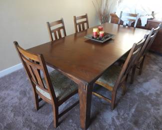Wood dining table & 6 chairs. Upholstered seats.