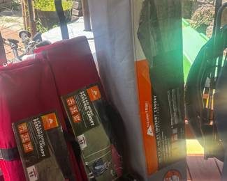 Several more canopies, lots of camp chairs, cot, etc