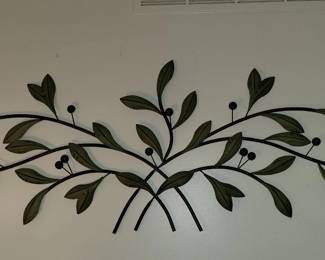 Black and green metal wall decor