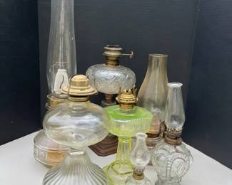 Vintage Glass Kerosine Oil Lamps Featuring A Pale Green Uranium Glass Base