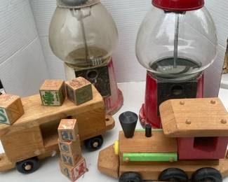 Old School Gum Ball Machines And Vintage Wooden Train