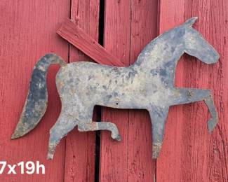 Heavy metal horse cut out from old sign