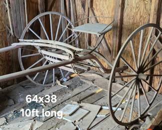 Horse drawn buggy as found in barn