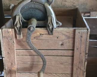 Antique grinder with crate box