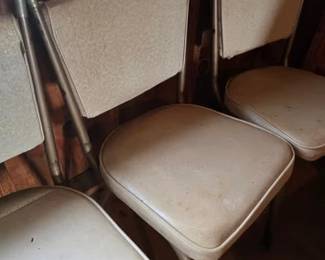 Retro metal and vinyl-covered kitchen chairs