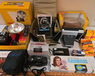 Collection of vintage cameras and film