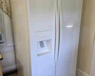 Side-by-side Whirlpool refrigerator