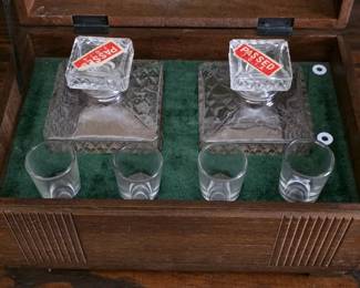 Bar set in chest with world map decoupaged on top