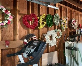 Multiple decorative and holiday wreaths