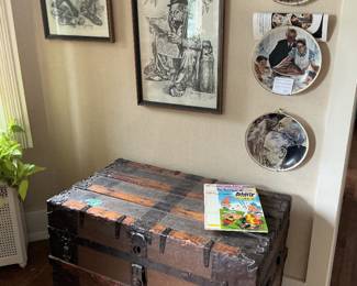 John Daly prints, older trunk and Norman Rockwell plates