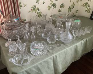 Large variety of cut glass pieces including Waterford pieces