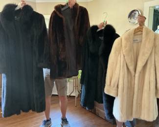 Four of the mink coats