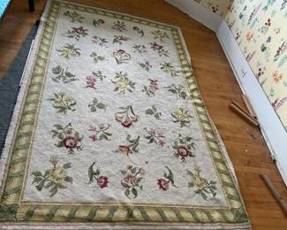 Decorative rug measures 8’3” x 5’3”. Has matching daybed cover and chair