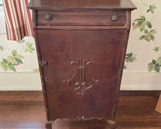 Antique record cabinet.