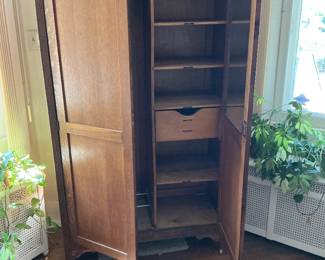 Hotel cabinet approximately 100 yrs old. In oak and has key. Drawers are labeled hats, gloves, etc. presale $95