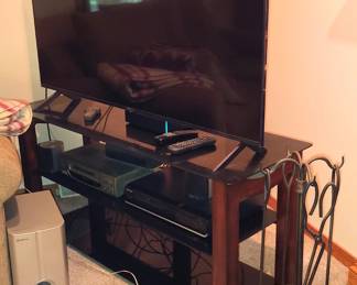 2024 LG 55" Flat Screen TV , Pioneer Sub Woofer and Speakers, Samsung Blue Ray, Magnavox VHS Player, Fireplace Tools, TV Stand.