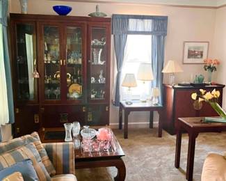 Beautifully Furnished Living Room Featuring matching Drexel Heritage furniture, crystal, artwork, home décor, and additional collectibles throughout the home.