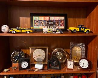 University of Michigan Memorabilia & Collectibles Featuring U of M collectibles, vintage clocks, books, die-cast vehicles, sports memorabilia, and more throughout the home.