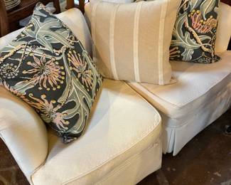 Love seat that converts into 2 corner chairs. $150 clearance. pillows are separate