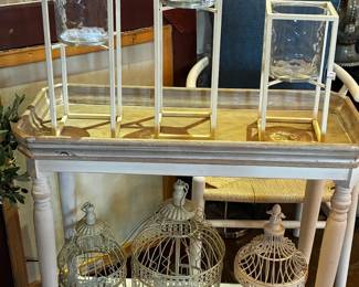 many candle holders and decorative bird cages 10 to 20 dollars
