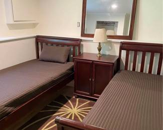 Not here yet.  asking 200 for both beds, mattresses included for free (but after house sells)