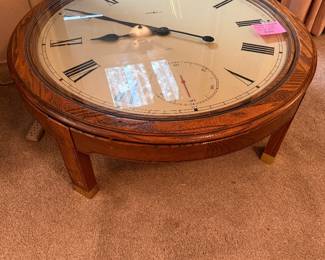 Howard Miller round Clock coffee table made from oak