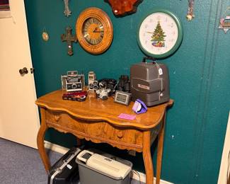 Antique 2 drawer table, clocks