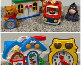 Winnie the Pooh Rattle, Little People Play House, Tigger Plush, little people fire truck, Eeyore Plush, 1970s Fisher-Price "Talk-to-Me" Player and an Animal Clock.