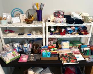 Craft and sewing supplies including fabric, yarn, knitting needles and more.