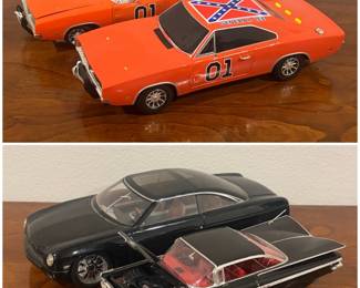 Diecast models of the "General Lee" 1969 Dodge Charger from The Dukes of Hazzard. Black 1961 Chevrolet Impala model car. 