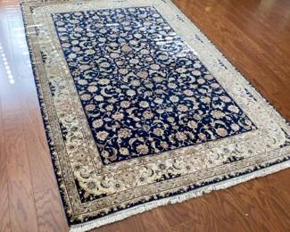 Blue Wool Rug With Floral Design