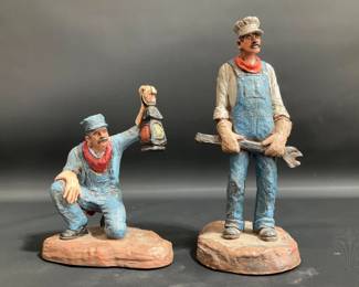 Two (2) Michael Garman Production "Engineer" Statues