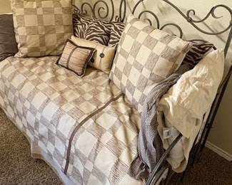 Ornate Metal Scrollwork Daybed with Checkered Bedding Set