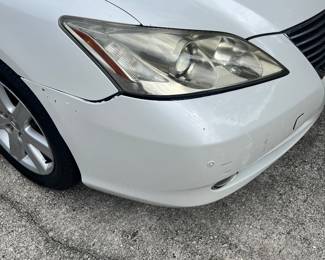 Fender front passenger side (owner hit side of garage)