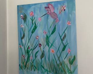 Un framed hummingbird picture