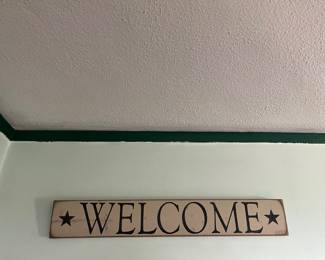 Wooden welcome, sign plaque