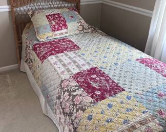 One of two twin wicker beds