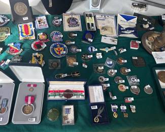 Assorted military medals and challenge coins