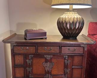 Several Asian side tables