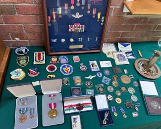 Assorted military medals and challenge coins