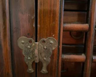 Close-up of the hardware pieces on the cabinet
