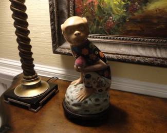 Porcelain Monkey holding the Peach